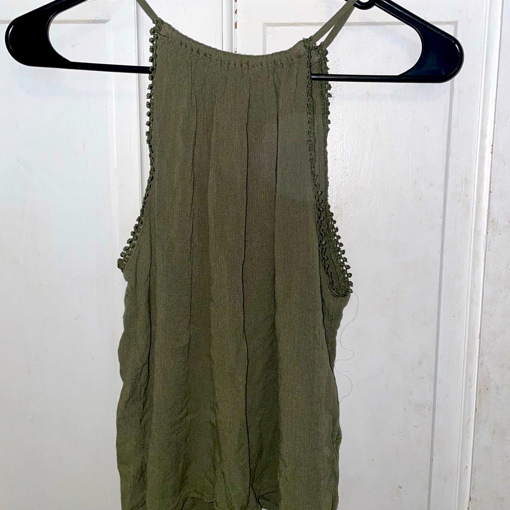It is a navy green loose tang top